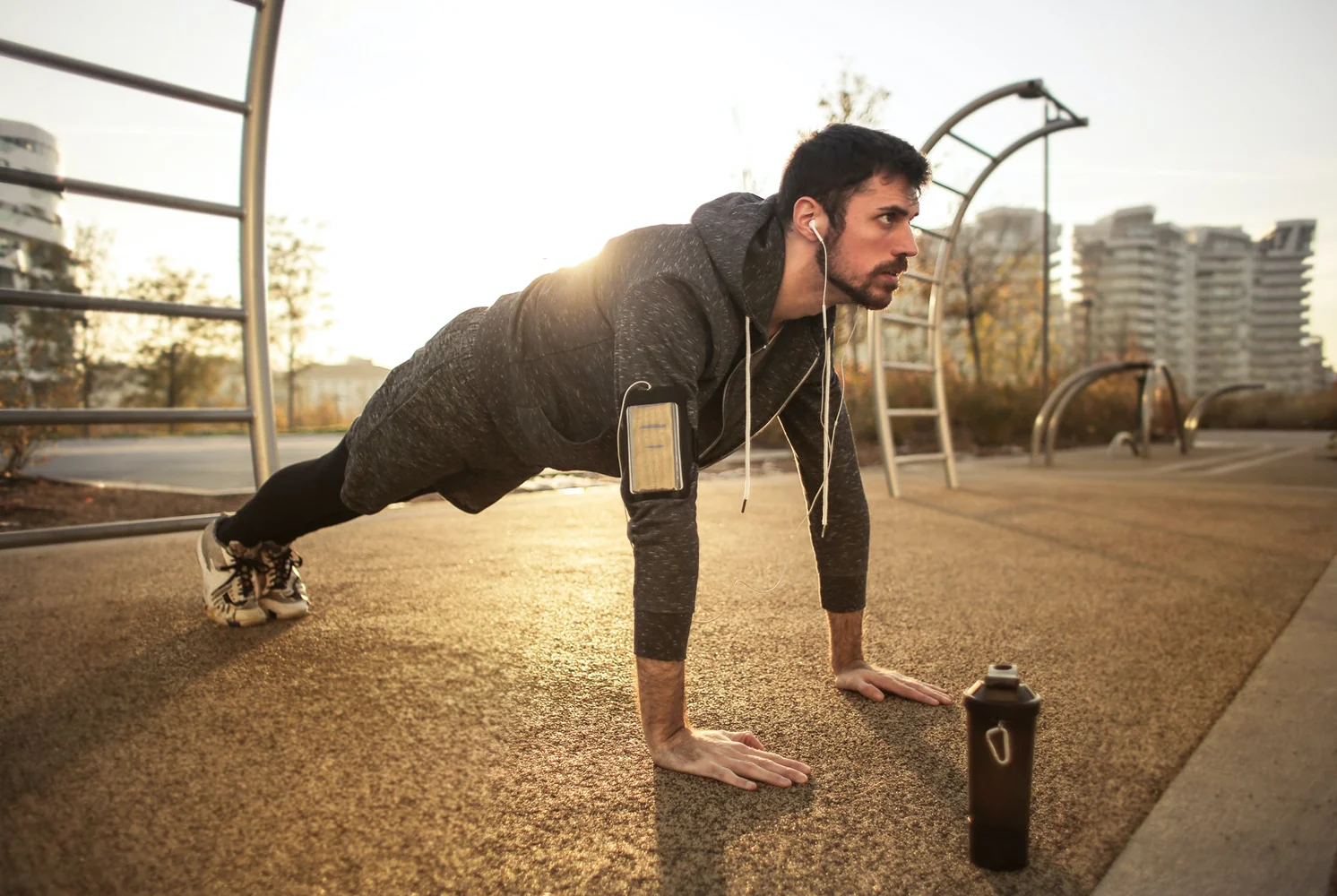 Man doing outdoor exercise with headphones